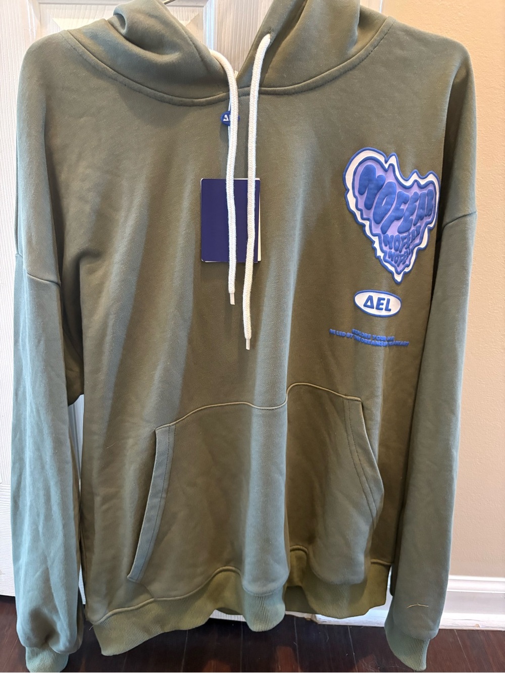 New with tags Aelfric Eden Olive Green Hoodie with Purple Heart Graphic medium